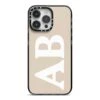 Initials IPhone Case -Wrap & Case Store Initials iPhone 14 Pro Max Black Impact Case on Silver phone